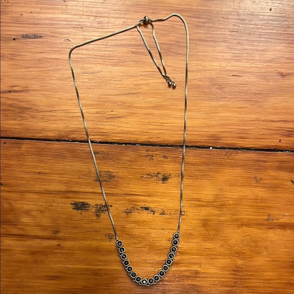 Elegant Gold and Black Necklace